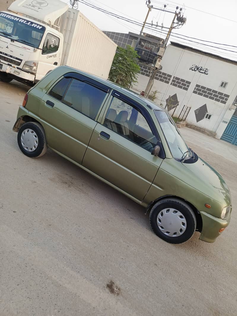 Daihatsu Cuore 2002 O3O6-OO3O44O 13