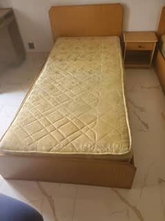 2 single bed with 1 side table is available  for sale