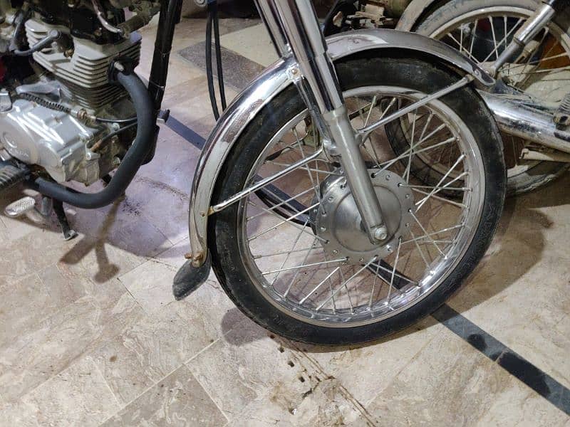 HONDA 125 2022-8month karachi number 9