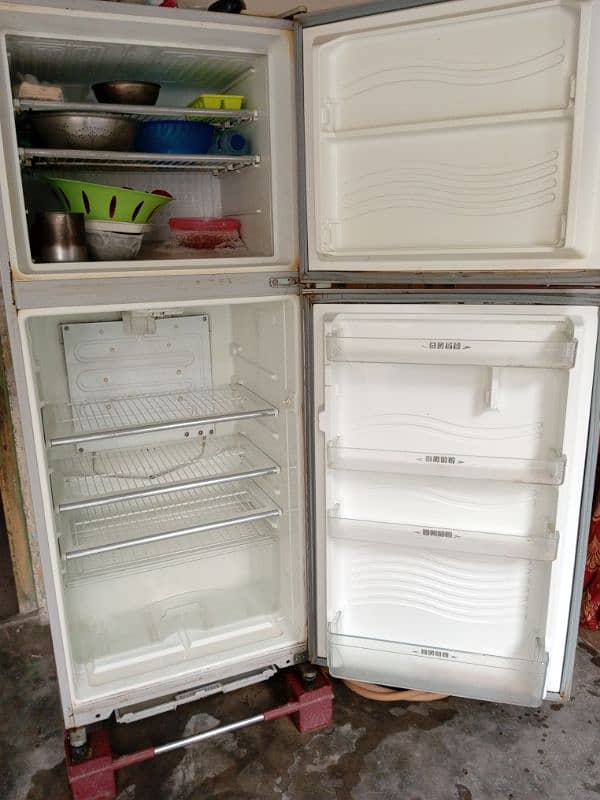 Dawlance Refrigerator In red Glass 3