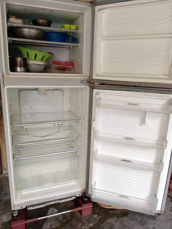 Dawlance Refrigerator In red Glass 4