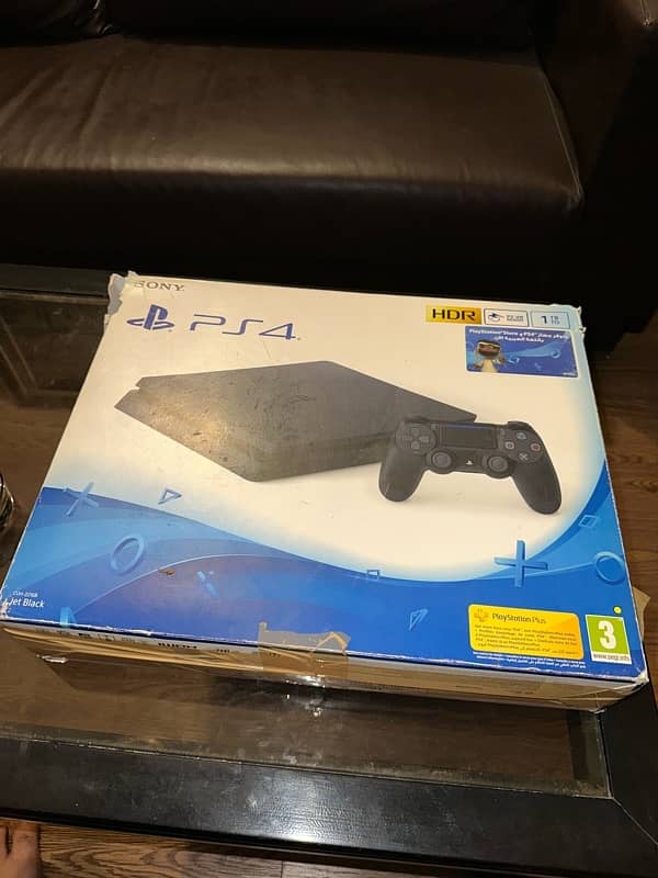 PS4 slim 1tb with box and accessories 1