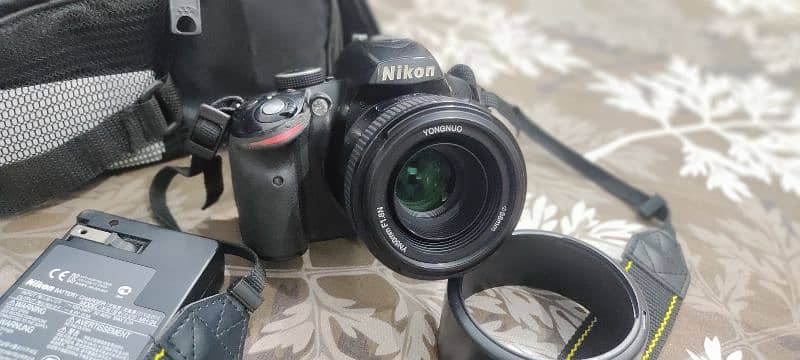 Nikon d3200 with Yongnuo 55mm lens 0