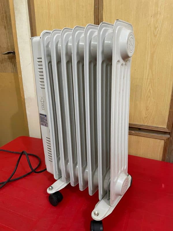 Daewoo 7 Fins Electric Oil Filled Radiator/ Heater 1