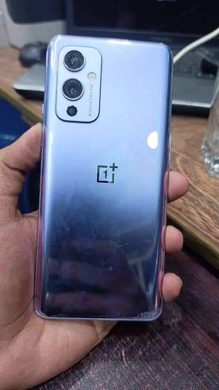 OnePlus 9 8/128 all ok ha Sirf display ma green line 0