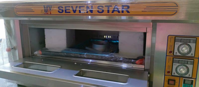 Used seven star pizza oven importad 4 large pizza capacity 52" 1