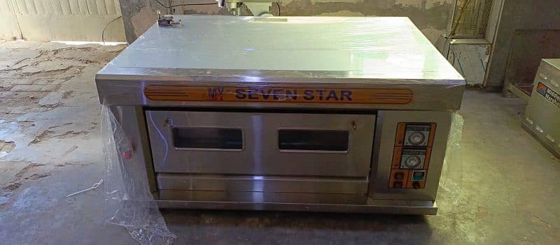 Used seven star pizza oven importad 4 large pizza capacity 52" 2