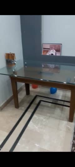 Urgent Dinning table with 5 chairs.