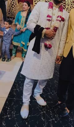 sherwani with kulla and khussa