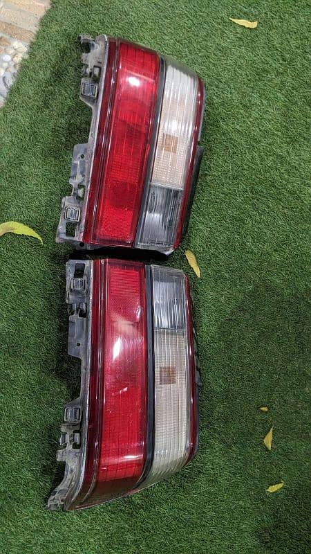 indus corolla door headlight taillight bumpers 11