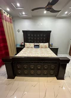 wood bed & side table and dressing table.