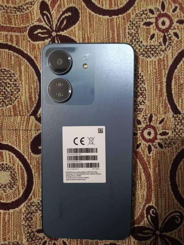 redmi 13c just 2month used non pta with charger and cover 7