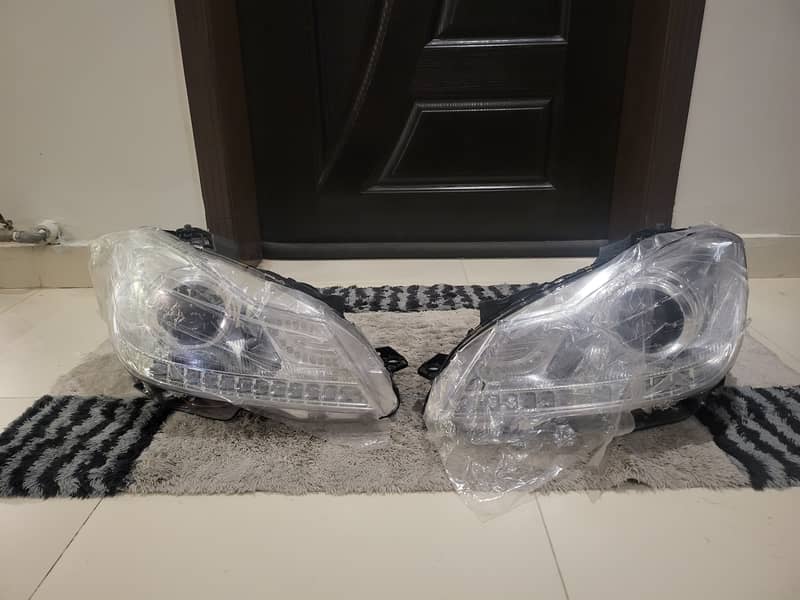 W204 C class Headlights Brand New. 11