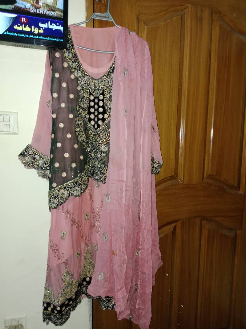 2 dresses in good condition for 5700 Long frock with shara stone work 5