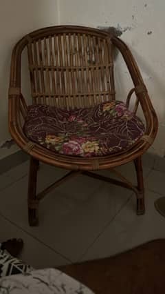 single indoor chair made of cane with cusion good condition for sale 0