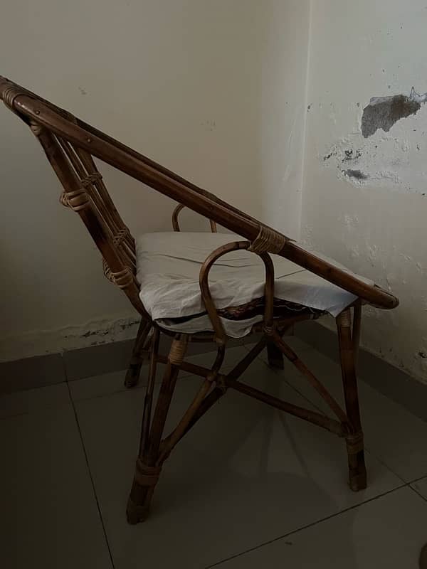 single indoor chair made of cane with cusion good condition for sale 1