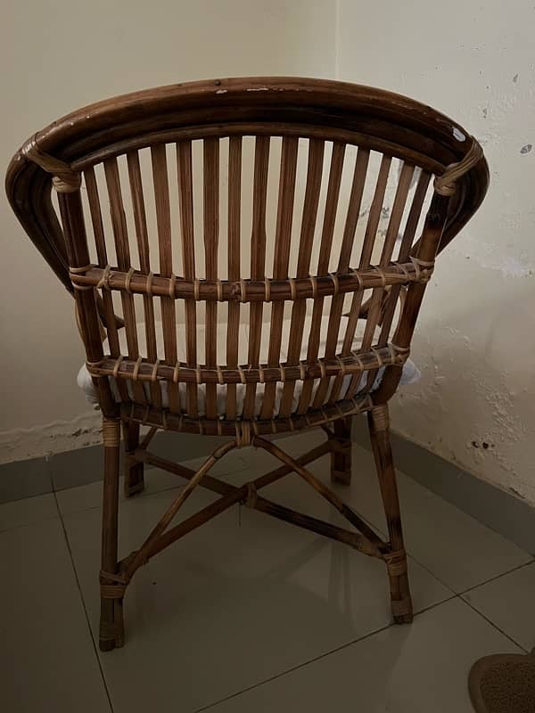 single indoor chair made of cane with cusion good condition for sale 2