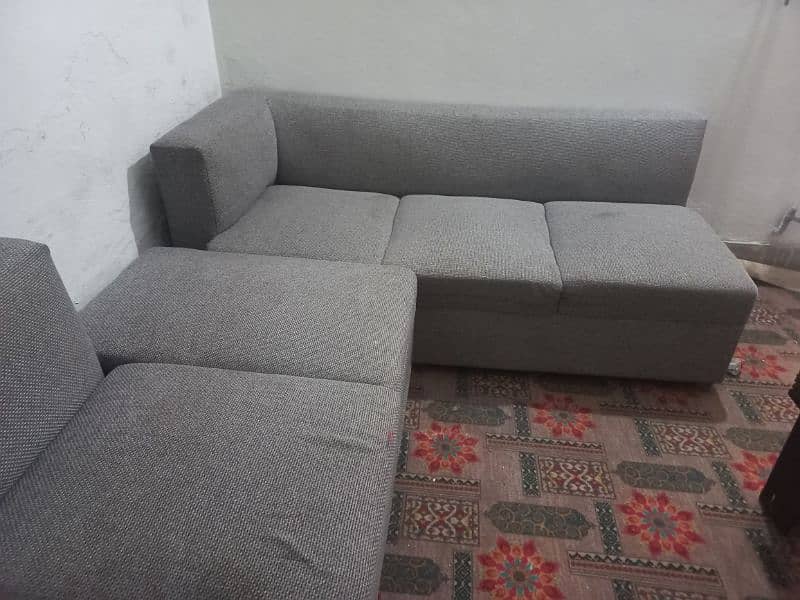 Lshaped sofa with table 1