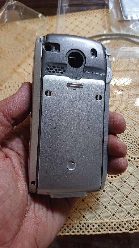 Sony Ericsson P910i Casing, Charger 2