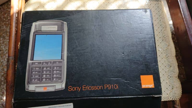 Sony Ericsson P910i Casing, Charger 5