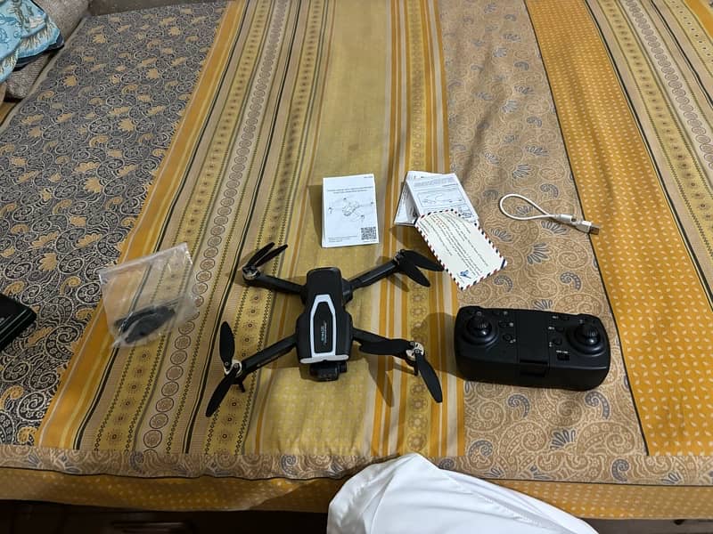 new drone only 5 times used a good  battery 10