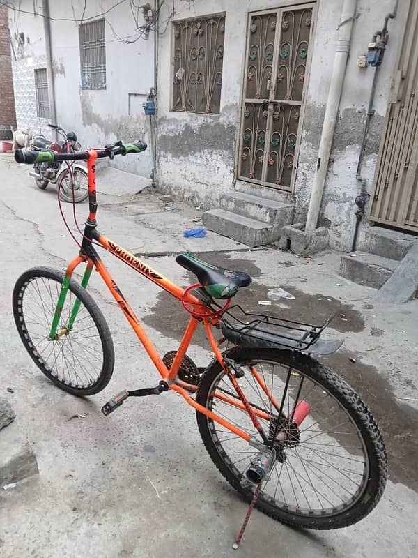 Mountain Bike in new condition . Single hand use. 3