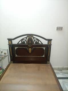 wooden single bed