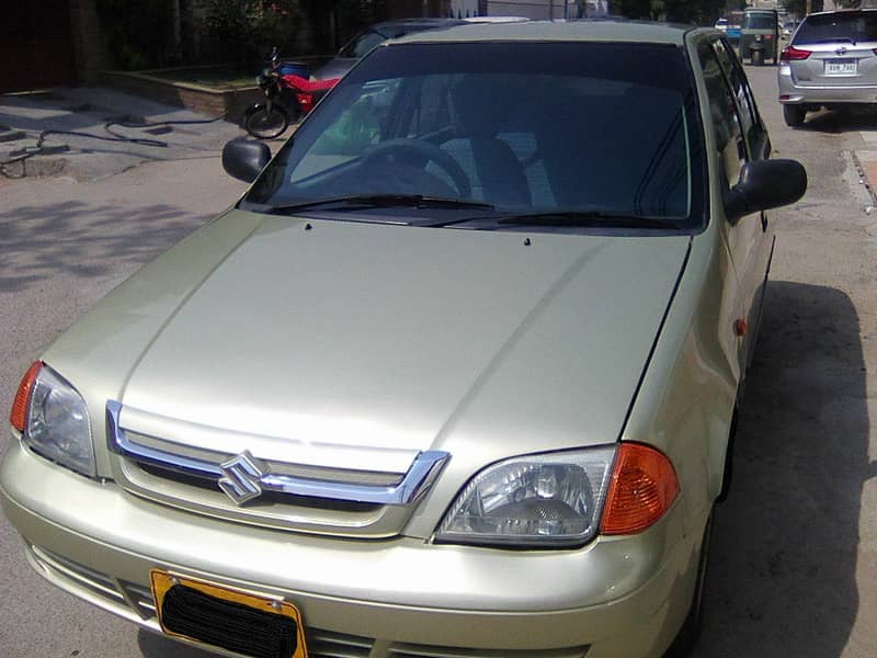 SUZUKI CULTUS VXR MODEL 2003 KING GOLD COLOUR BEHTREEN CONDITION 12