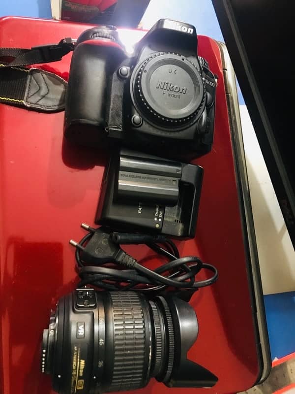 Nikon D7100 mint condition with original battery,charger and 18-55lens 12