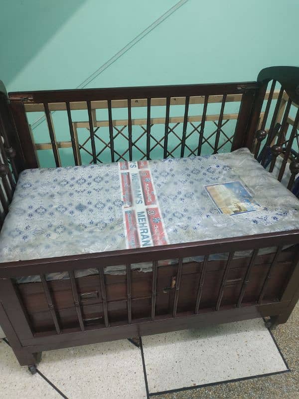 baby cot and swing in excellent condition 1