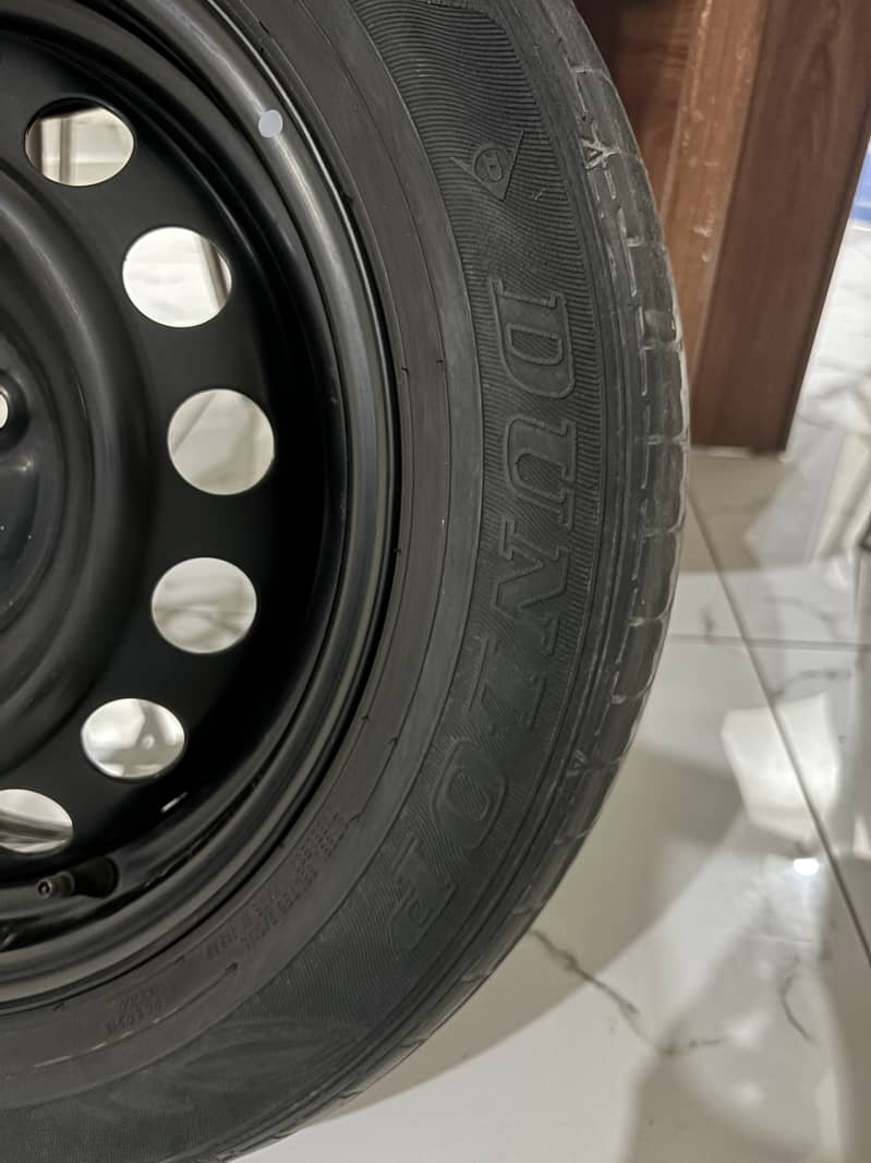 Dunlop Tyre with Steel Rim 175/65/15 1