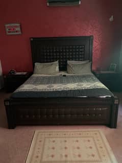 Bed with side table and dressing