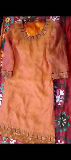 fancy three pcs orange dress medium size. .