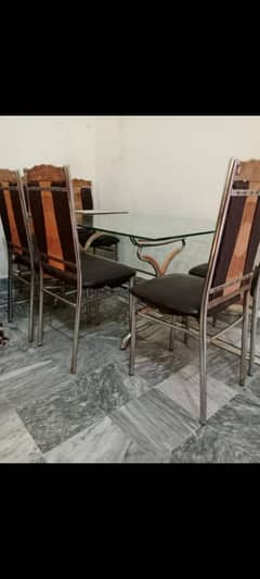 heavy glass dining table with 6 chairs for sale 0