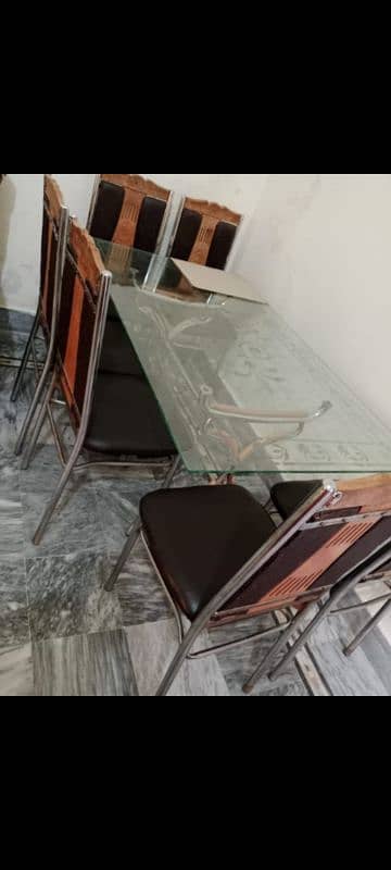 heavy glass dining table with 6 chairs for sale 1