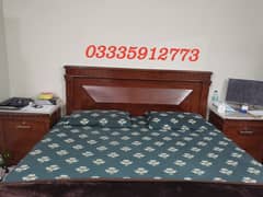 king size wooden bed with dressing table