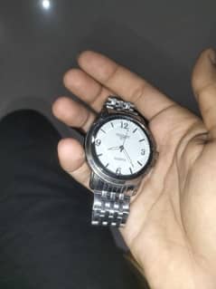 2 watches in cheap rate one is Tissot and second one is BAISHENG 0