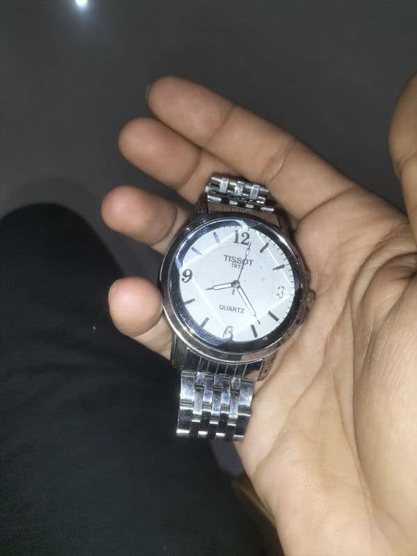 2 watches in cheap rate one is Tissot and second one is BAISHENG 1