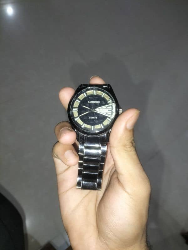 2 watches in cheap rate one is Tissot and second one is BAISHENG 4