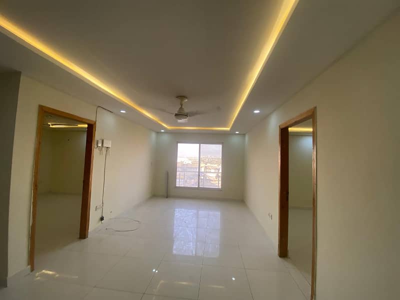 The ideal 3bedrooms unfurnished apartment available for Rent in E 11 4 main margalla road with Wapda Meter 1