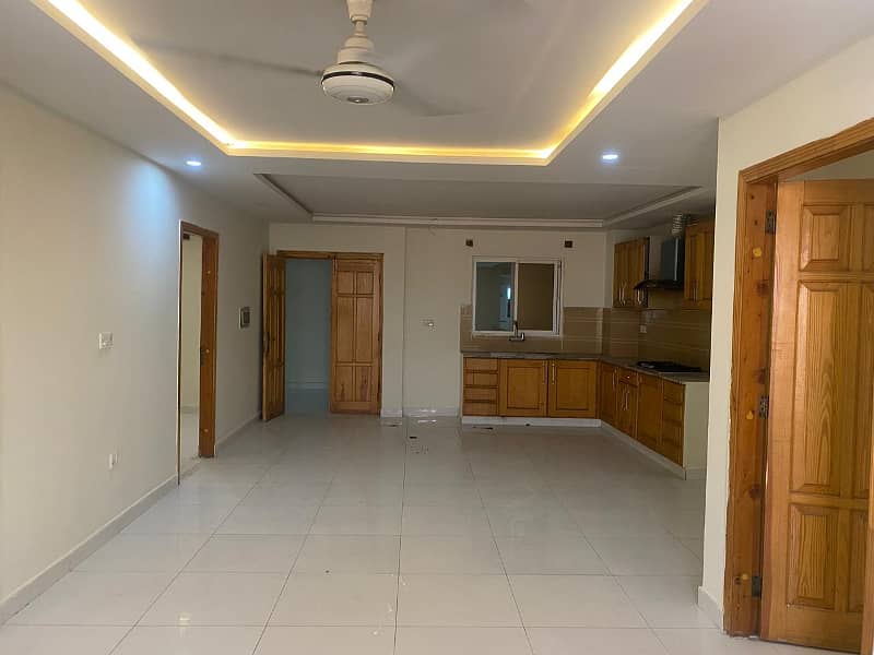 The ideal 3bedrooms unfurnished apartment available for Rent in E 11 4 main margalla road with Wapda Meter 6