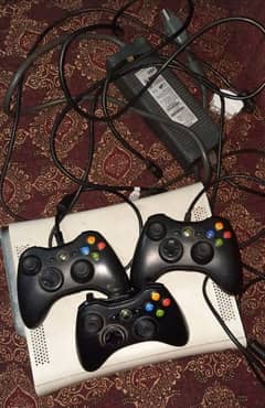 Xbox 360 with 3 controllers 27 games installed