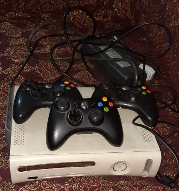 Xbox 360 with 3 controllers 27 games installed 2