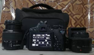 Canon 650d Touch dslr camera with two lenses for photos and videos