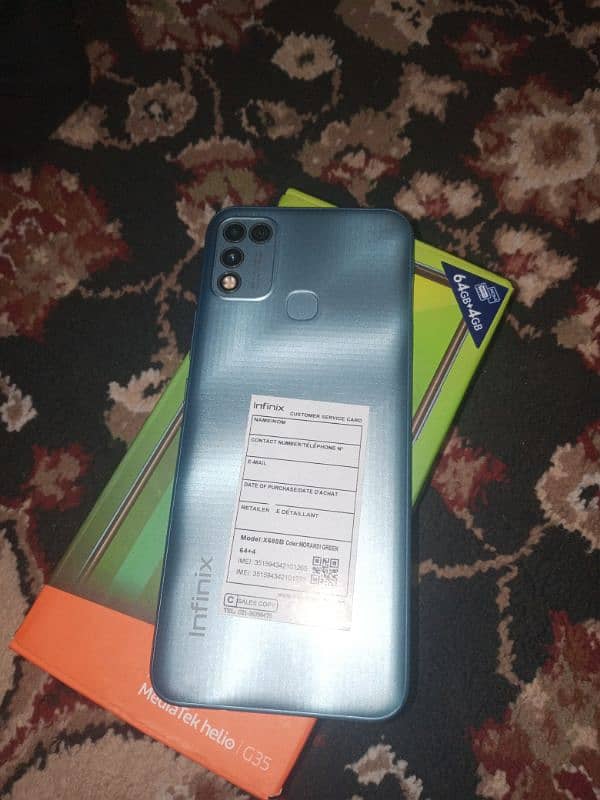 Infinix hot 10 play 4 64 all ok with sim tool and one new cover 0