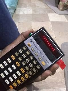 vintage since 1970s calculator with original box , original leatherbeg