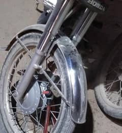 front mudguard 125 original Honda 03112321320