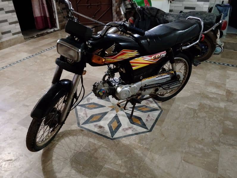 black colour Honda cd70 demand 1 lack 3