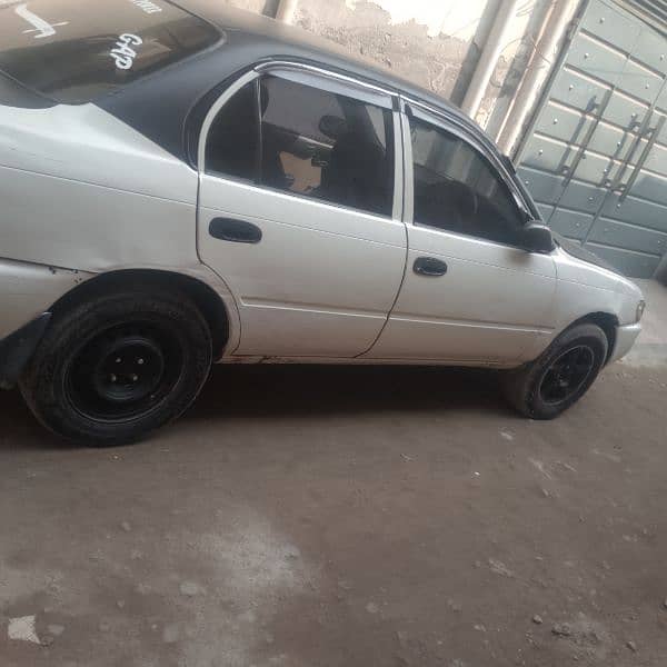 Toyota Corolla 2.0 D Saloon 2000 model. need cash. supordari parpar ha 4