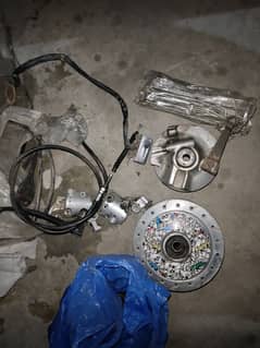 Honda 125 2000 model front hub with grips and original wires